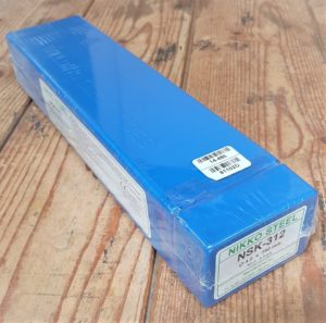 Blue Wrapped Package On Wooden Surface