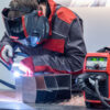 Man Using Fronius Machine And Gear To Weld