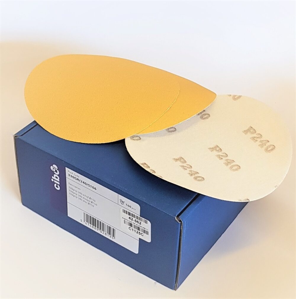 Yellow Sanding Discs On Blue Box